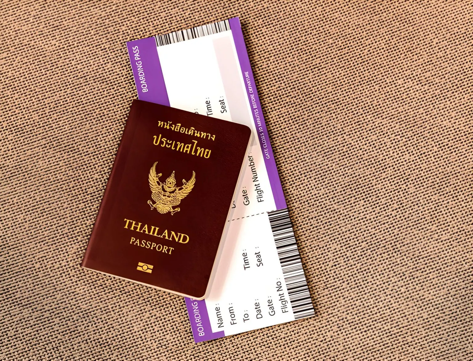 Thailand passport and boarding pass